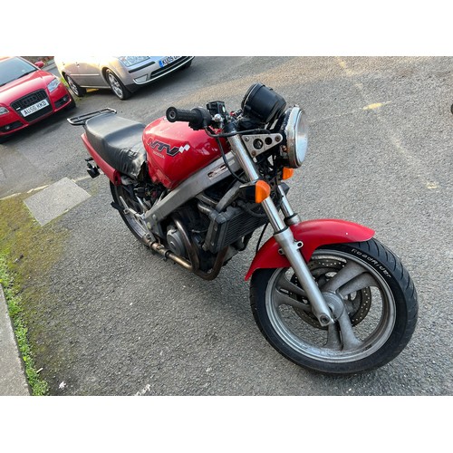 33 - Red Honda NTV registration P699TGN, 80485 miles on the clock this motorbike is a restoration piece, ... 