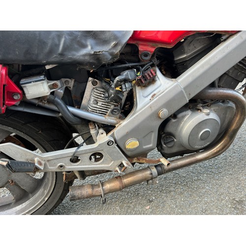 33 - Red Honda NTV registration P699TGN, 80485 miles on the clock this motorbike is a restoration piece, ... 