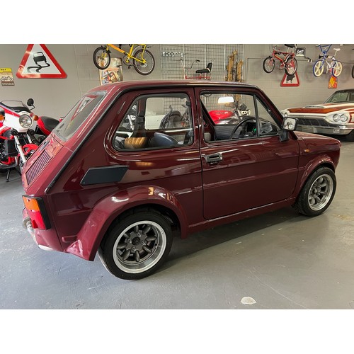 1987 Burgundy Fiat 126 powered by a ZZR1100 Petrol engine which pushes ...