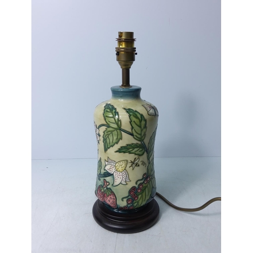 157 - Floral decorated Moorcroft lamp, 32cms in height