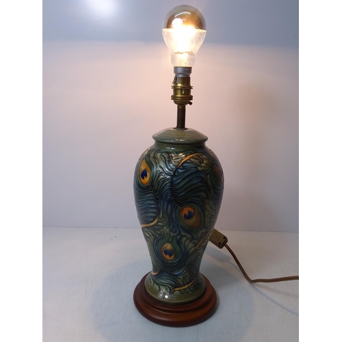 158 - Floral decorated Moorcroft lamp, 37cms in height