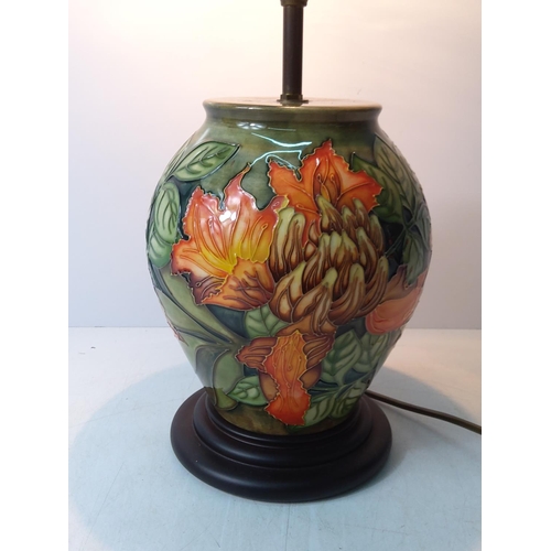 159 - Floral decorated Moorcroft lamp, 36cms in height