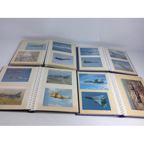 162 - 4 albums of military aircraft postcards and 3 albums of commercial aircraft postcards