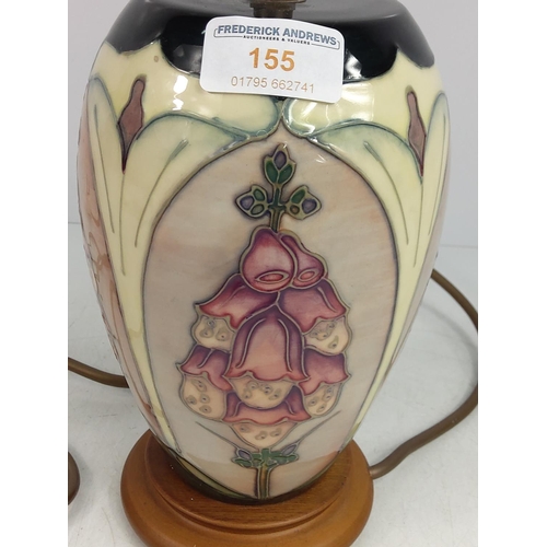 155 - Floral decorated Moorcroft lamp, 28cms in height