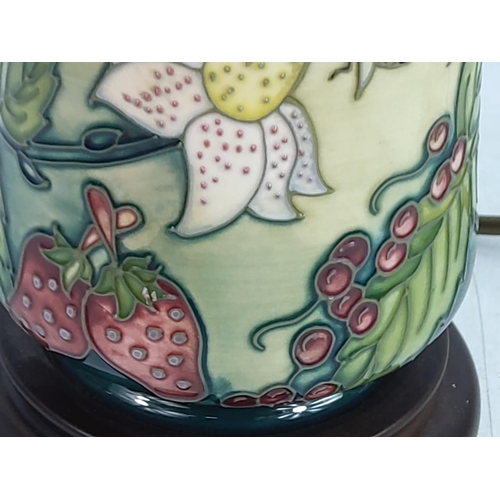 157 - Floral decorated Moorcroft lamp, 32cms in height