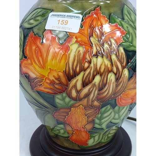 159 - Floral decorated Moorcroft lamp, 36cms in height