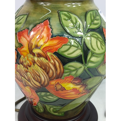 159 - Floral decorated Moorcroft lamp, 36cms in height