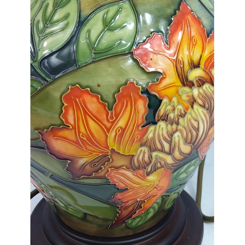 159 - Floral decorated Moorcroft lamp, 36cms in height