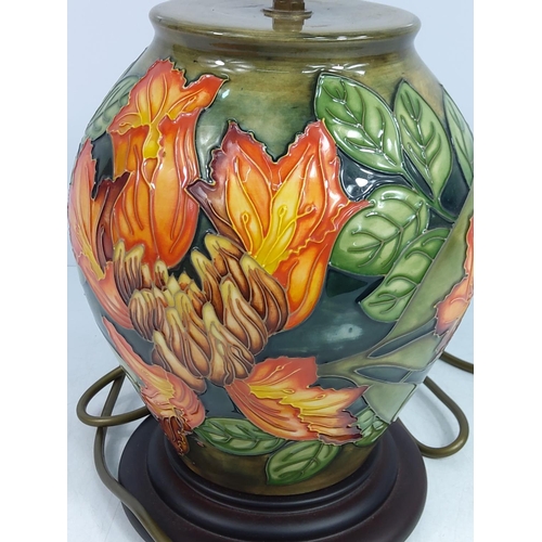 159 - Floral decorated Moorcroft lamp, 36cms in height