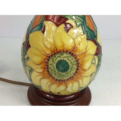 160 - Floral decorated Moorcroft lamp (needs to be re-wired), 26cms in height