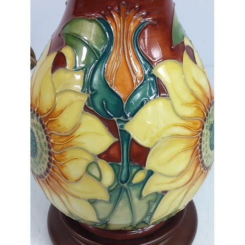 160 - Floral decorated Moorcroft lamp (needs to be re-wired), 26cms in height