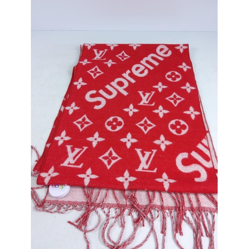 191 - Louis Vuitton scarf and a Supreme hat