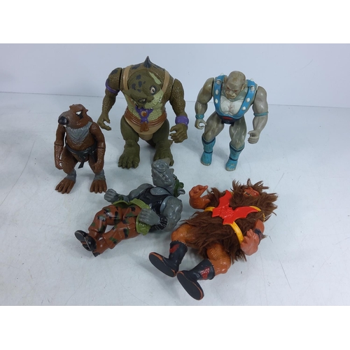 206 - Box of wrestlers and action figures including Ghostbuster characters, He-Man & Battle Cat, The Simps... 