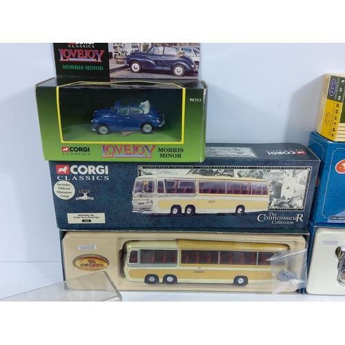 126 - Collection of 11 boxed and cased model vehicles