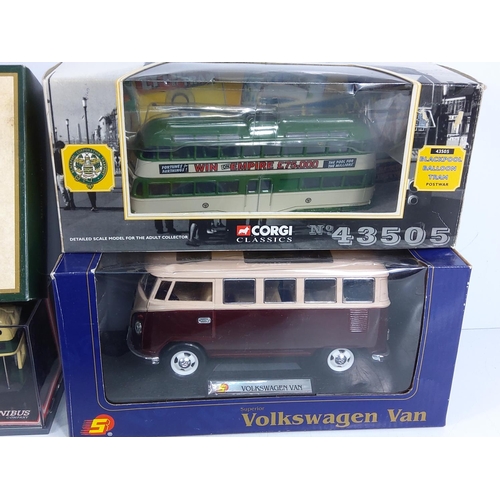 127 - Collection of 8 cased model vehicles