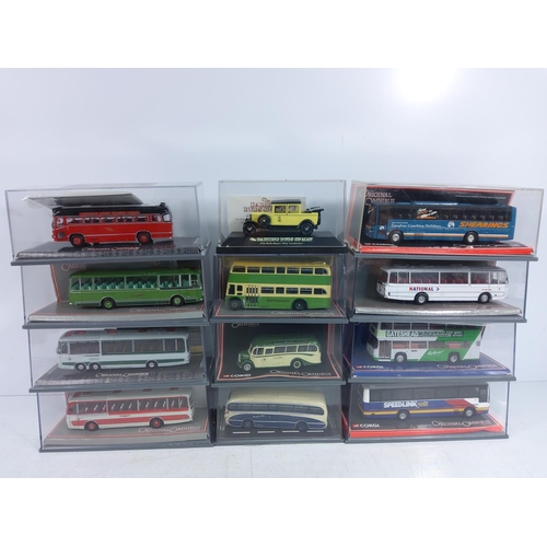 129 - 11 boxed Corgi buses plus one