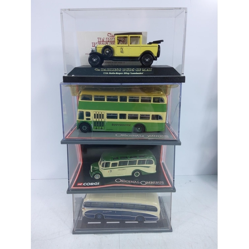 129 - 11 boxed Corgi buses plus one