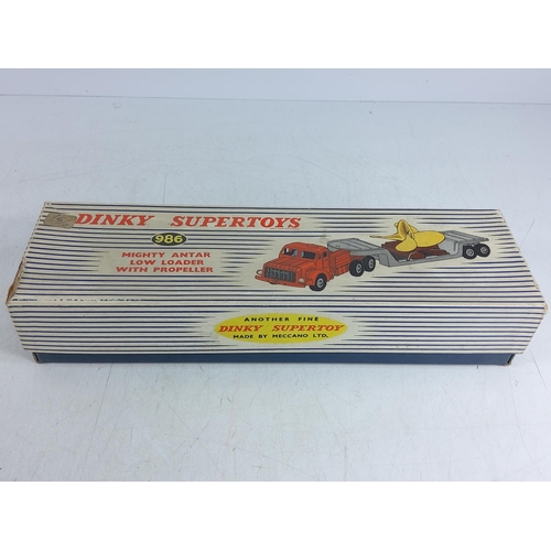 84 - Boxed Dinky low-loader with propeller, model no. 986