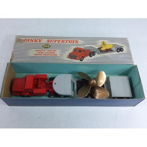 84 - Boxed Dinky low-loader with propeller, model no. 986