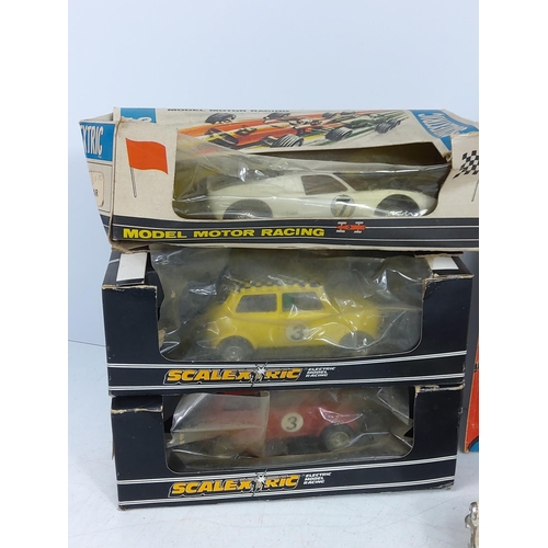 14 - Various vintage scalextric cars including boxed examples and a vintage Superman comic