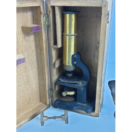 15 - Cast metal Royal bust and a vintage cased microscope