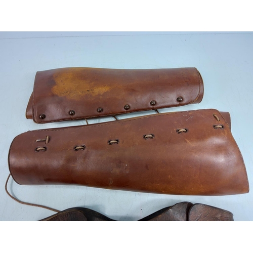 2 - 2 pairs of leather gaiters