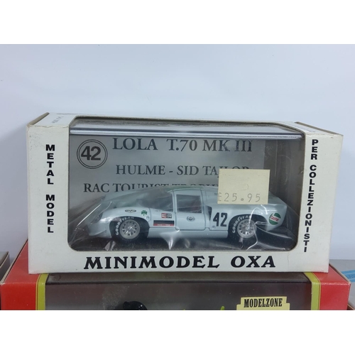 33 - Boxed model vehicles