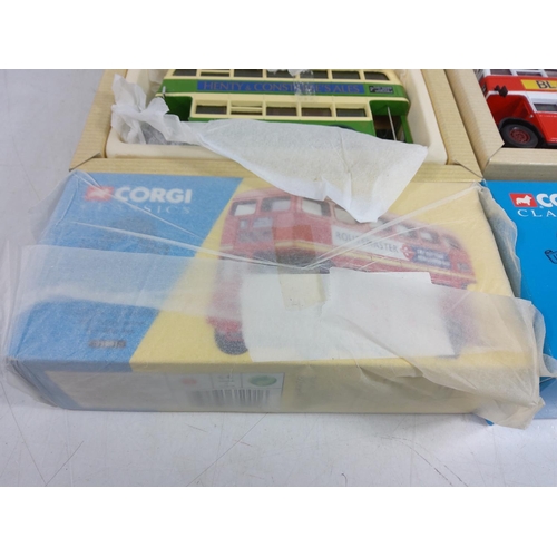 35 - 5 boxed Corgi buses