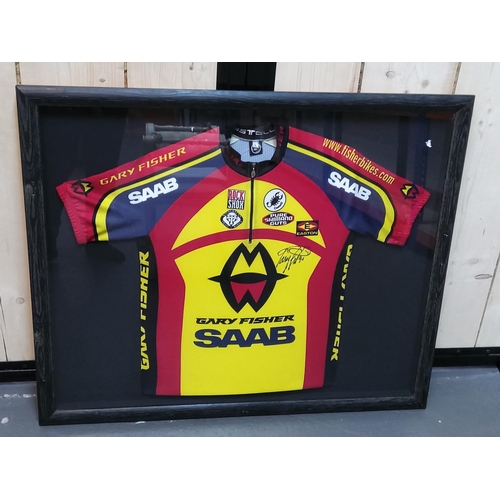 110 - Mounted Gary Fisher racing jersey signed, 102 x 84cms