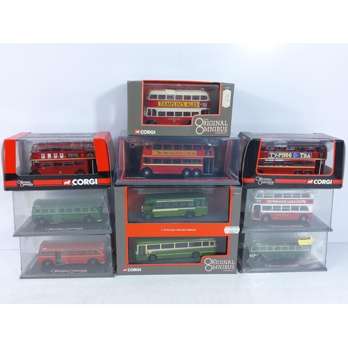 153 - 10 boxed Corgi buses