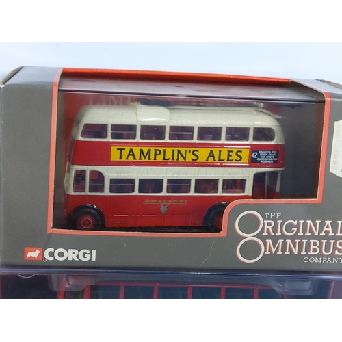 153 - 10 boxed Corgi buses