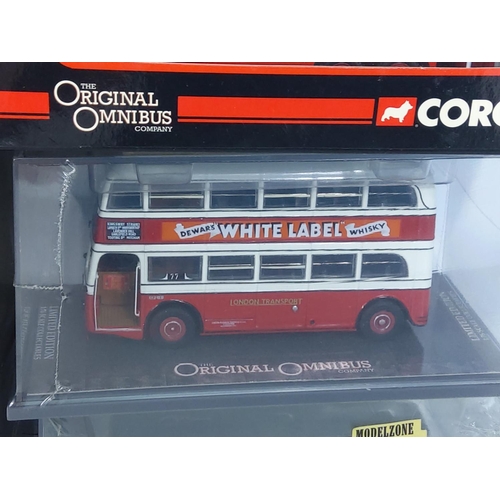 153 - 10 boxed Corgi buses