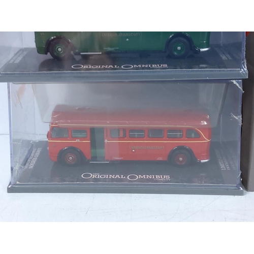 153 - 10 boxed Corgi buses