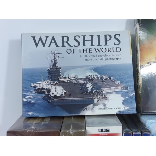 184 - Various DVD sets and books including Formula One and Warships