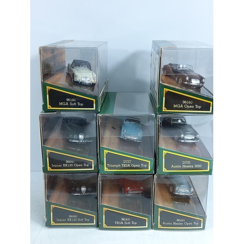 57 - Corgi wooden display plinth with boxed model vehicles