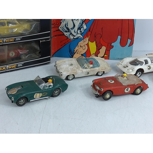 14 - Various vintage scalextric cars including boxed examples and a vintage Superman comic