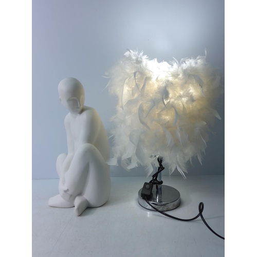 91 - Porcelain figure and a feather lamp