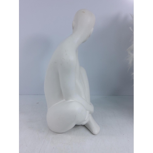 91 - Porcelain figure and a feather lamp