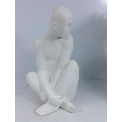 91 - Porcelain figure and a feather lamp