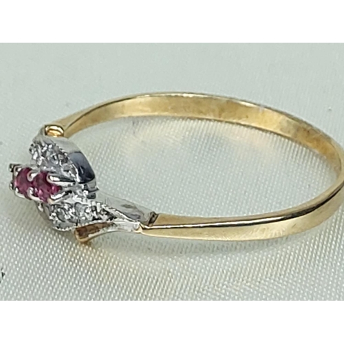 292 - 9ct gold garnet and diamond twist ring, size W