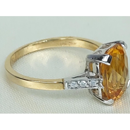 296 - 9ct gold citrine and diamond ring, size O