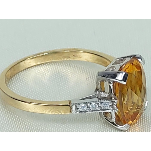 296 - 9ct gold citrine and diamond ring, size O