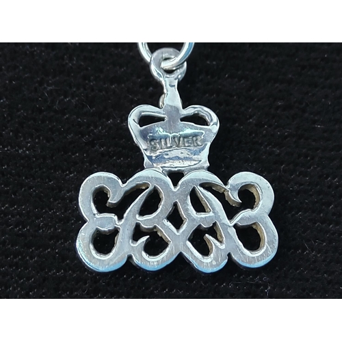 309 - Silver stone set Royal Commemorative pendant on chain