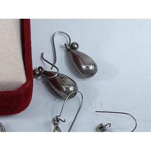 332 - Silver rings and earrings