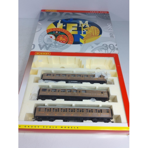 243 - 2 boxed Hornby train packs 3025 & 3026 (both engines missing)