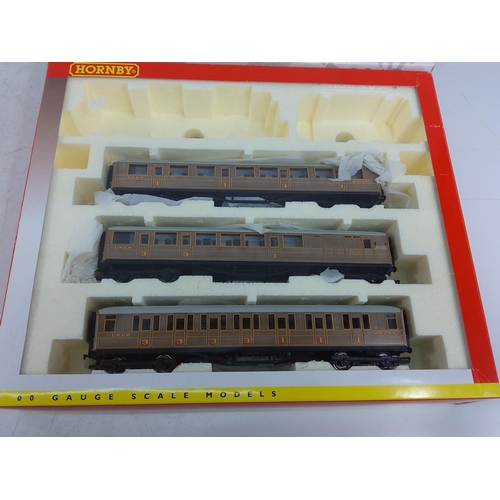 243 - 2 boxed Hornby train packs 3025 & 3026 (both engines missing)