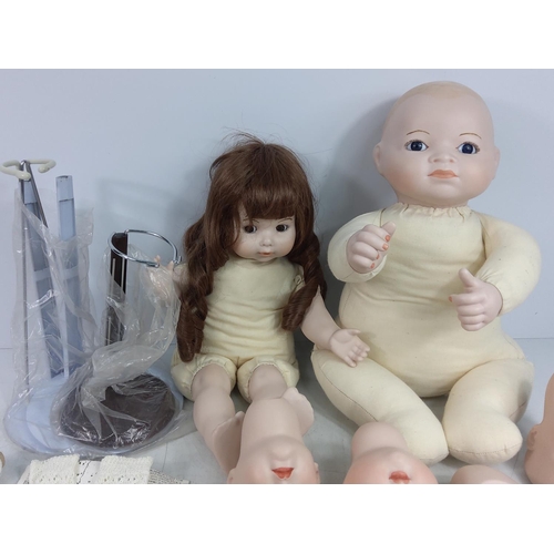 107 - Porcelain dolls etc