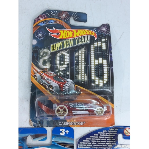 126 - 5limited edition Hot Wheels cars in blister packs, including Batman