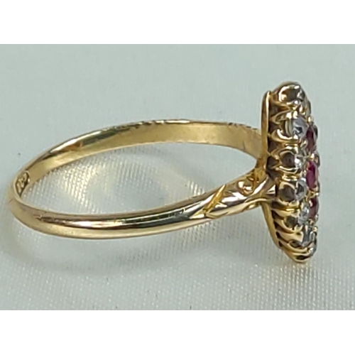 301 - 18ct gold ruby and diamond cluster ring, size N