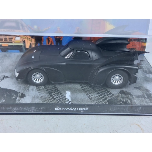 83 - Boxed model vehicles including Batman